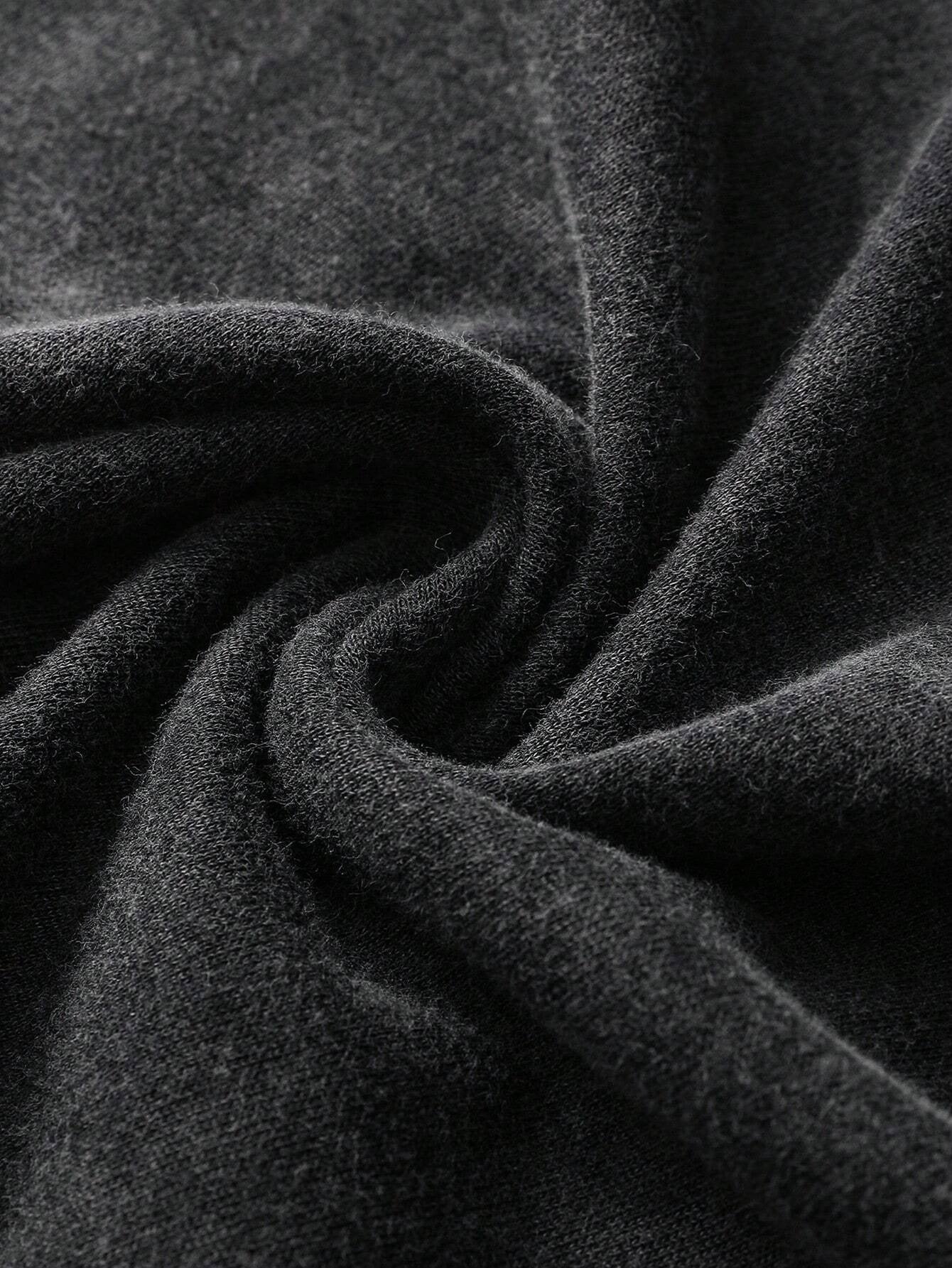 a close up view of a black fabric