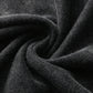 a close up view of a black fabric